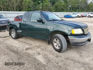2003 Ford F-150 XL with VIN 1FTRX07WX3KB99581, listed as a Copart auction lot 56907765 with 232,597 mi miles and Salvage title. Bid and sale history available at DreamBid. Image 4.