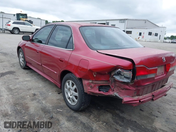 2002 Honda Accord EX z VIN 1HGCG56632A038404, wystawiony jako IAAI lot #42370161 z przebiegiem 262 308 mil mil oraz . Historia ofert i sprzedaży dostępna na DreamBid. Obrazek 3.
