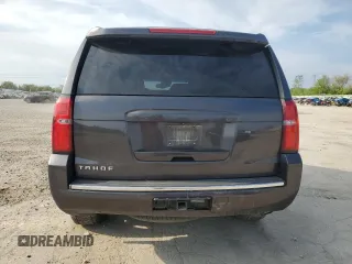 2015 Chevrolet Tahoe LTZ z VIN 1GNSKCKC4FR626030, wystawiony jako Copart lot #56280805 z przebiegiem Nie podano mil oraz Szkoda całkowita • Salvage title. Historia ofert i sprzedaży dostępna na DreamBid. Obrazek 6.