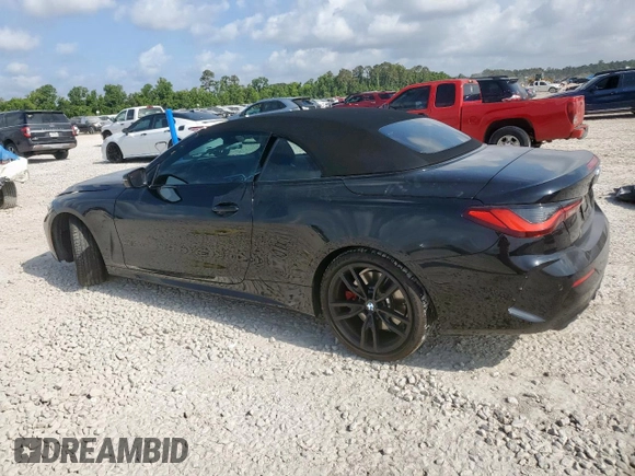 2023 BMW 4 Series M440i with VIN WBA53AT06PCM44083, listed as a Copart auction lot 58314465 with Not provided miles and Salvage title. Bid and sale history available at DreamBid. Image 2.