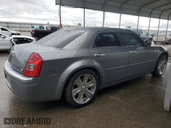 2006 Chrysler 300 C with VIN 2C3KA63H26H218136, listed as a Copart auction lot 49209315 with 215,682 mi miles and Salvage Title. Bid and sale history available at carsss.com. Image 3.