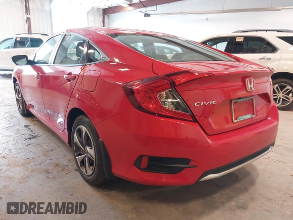 2020 Honda Civic LX with VIN 2HGFC2F63LH507310, listed as a IAAI auction lot 42180914 with 54,599 mi miles and . Bid and sale history available at DreamBid. Image 3.