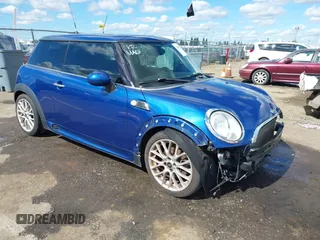 2012 MINI Hardtop with VIN WMWSU3C55CT260643, listed as a IAAI auction lot 41658134 with 105,690 mi miles and . Bid and sale history available at DreamBid. Image 1.
