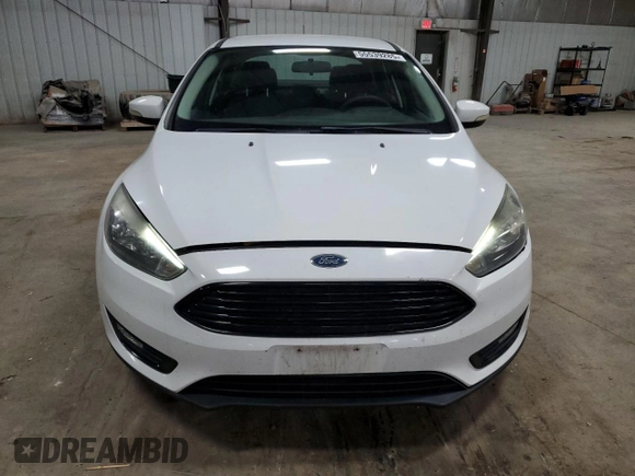 2016 Ford Focus SE с VIN 1FADP3FE8GL324863, выставлен на аукционе Copart как лот 55539285 с пробегом 135 245 миль миль и Списание • Salvage title. История ставок и продаж доступна на DreamBid. Изображение 5.