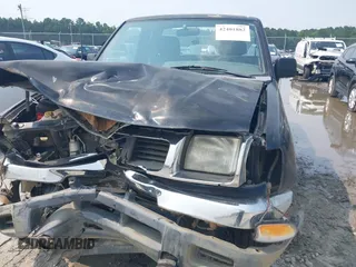 1998 Nissan Frontier XE with VIN 1N6DD26S4WC358779, listed as a IAAI auction lot 42401882 with Not provided miles and . Bid and sale history available at DreamBid. Image 6.