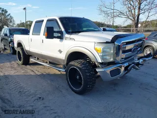 2014 Ford Super Duty F-250 SRW XL with VIN 1FT7W2BT4EEB32396, listed as a IAAI auction lot 41229390 with 196,303 mi miles. Bid and sale history available at carsss.com. Image 1.