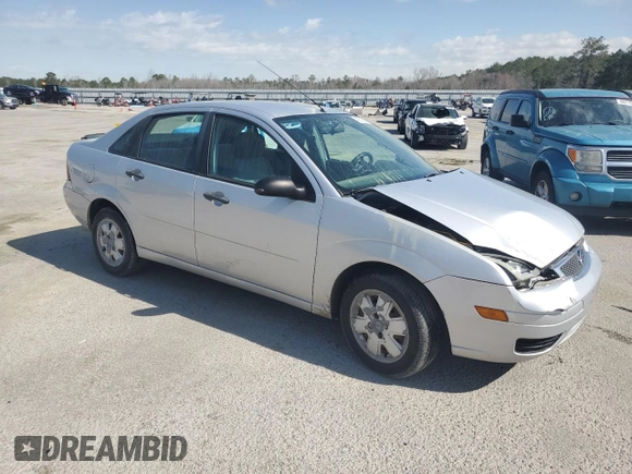 2007 Ford Focus S with VIN 1FAFP34N87W171671, listed as a Copart auction lot 49335385 with 140,638 mi miles and Salvage Title. Bid and sale history available at carsss.com. Image 4.
