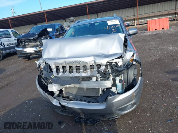 2020 Jeep Cherokee Latitude Plus with VIN 1C4PJMLB4LD652178, listed as a IAAI auction lot 41865642 with 77,096 mi miles and . Bid and sale history available at DreamBid. Image 6.