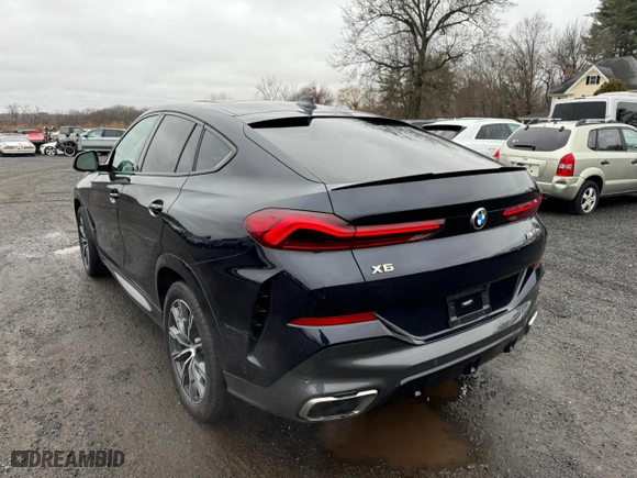 2021 BMW X6 M50i with VIN 5UXCY8C02M9D95172, listed as a Copart auction lot 84796854 with 75,299 mi miles and Clean Title. Bid and sale history available at carsss.com. Image 2.
