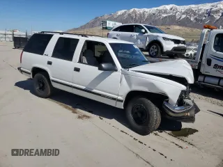 1999 GMC Yukon with VIN 1GKEC13R4XJ809507, listed as a Copart auction lot 50922655 with 227,923 mi miles and Salvage Title. Bid and sale history available at carsss.com. Image 4.