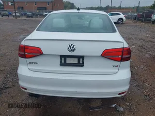 2015 Volkswagen Jetta SE z VIN 3VWD17AJ1FM225271, wystawiony jako IAAI lot #40353904 z przebiegiem 83 317 mil mil oraz . Historia ofert i sprzedaży dostępna na DreamBid. Obrazek 17.