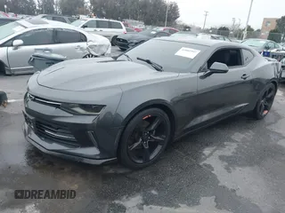 2017 Chevrolet Camaro 1LT with VIN 1G1FB1RX5H0216019, listed as a IAAI auction lot 41881997 with 84,505 mi miles. Bid and sale history available at carsss.com. Image 2.