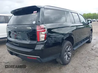 2022 Chevrolet Suburban Z71 with VIN 1GNSKDKD7NR345224, listed as a IAAI auction lot 42007246 with 50,300 mi miles and . Bid and sale history available at DreamBid. Image 4.