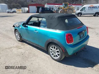 2016 MINI Convertible z VIN WMWWG5C53G3C18842, wystawiony jako IAAI lot #41864596 z przebiegiem 91 253 mil mil oraz . Historia ofert i sprzedaży dostępna na DreamBid. Obrazek 3.