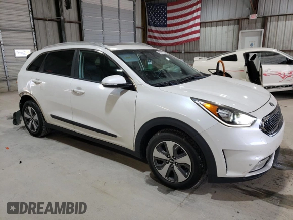 2018 Kia Niro Touring with VIN KNDCE3LC3J5140957, listed as a Copart auction lot 82687224 with 138,432 mi miles and Salvage Title. Bid and sale history available at carsss.com. Image 4.