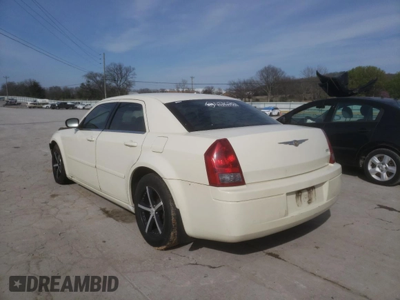 2005 Chrysler 300 with VIN 2C3JA43R25H663094, listed as a Copart auction lot 60813664 with 218,830 mi miles and Salvage Title. Bid and sale history available at carsss.com. Image 2.