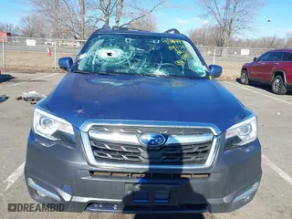 2018 Subaru Forester Touring with VIN JF2SJAWCXJH467976, listed as a IAAI auction lot 41744472 with 98,919 mi miles. Bid and sale history available at carsss.com. Image 12.