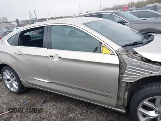 2015 Chevrolet Impala LTZ with VIN 2G1165S3XF9132682, listed as a IAAI auction lot 41995711 with 232,722 mi miles and . Bid and sale history available at DreamBid. Image 14.