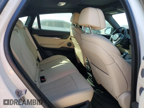 2018 BMW X6 sDrive35i with VIN 5UXKU0C5XJ0G69741, listed as a Copart auction lot 77366934 with 66,287 mi miles and Salvage Title. Bid and sale history available at carsss.com. Image 11.