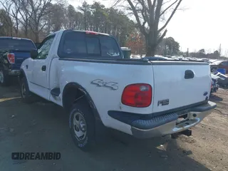 2004 Ford F-150 z VIN 2FTRF08W14CA09335, wystawiony jako IAAI lot #41620000 z przebiegiem 121 102 mil mil oraz . Historia ofert i sprzedaży dostępna na DreamBid. Obrazek 3.