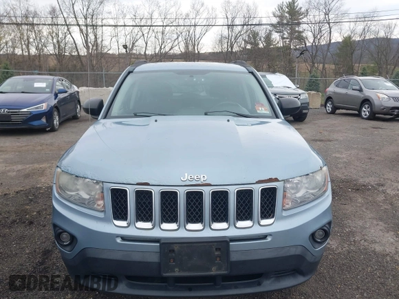 2013 Jeep Compass High Altitude with VIN 1C4NJCEAXDD276528, listed as a IAAI auction lot 41999981 with 177,047 mi miles. Bid and sale history available at carsss.com. Image 6.