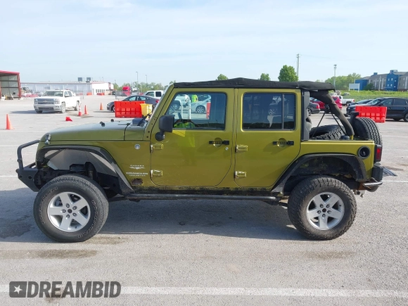 2007 Jeep Wrangler Unlimited Sahara with VIN 1J4GA59177L182593, listed as a IAAI auction lot 42104934 with 158,990 mi miles and . Bid and sale history available at DreamBid. Image 14.
