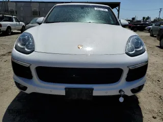 2018 Porsche Cayenne z VIN WP1AA2A29JKA01259, wystawiony jako Copart lot #55061165 z przebiegiem 100 451 mil mil oraz Czysty tytuł • Clean title. Historia ofert i sprzedaży dostępna na DreamBid. Obrazek 5.