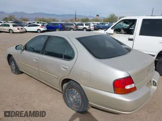 1998 Nissan Altima XE with VIN 1N4DL01DXWC253625, listed as a IAAI auction lot 41517801 with 194,609 mi miles. Bid and sale history available at carsss.com. Image 3.