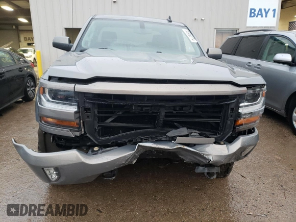 2017 Chevrolet Silverado 1500 LT with VIN 3GCUKREC0HG287527, listed as a Copart auction lot 84900274 with 121,617 mi miles and Salvage Title. Bid and sale history available at DreamBid. Image 5.