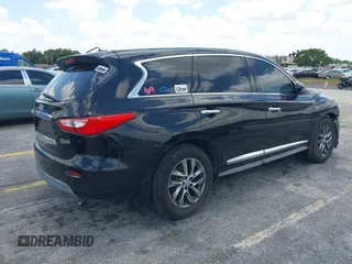 2015 Infiniti QX60 with VIN 5N1AL0MNXFC511350, listed as a IAAI auction lot 42117809 with 128,274 mi miles and . Bid and sale history available at DreamBid. Image 4.
