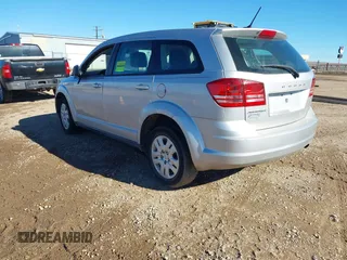 2014 Dodge Journey American Value Pkg with VIN 3C4PDCAB5ET119192, listed as a IAAI auction lot 41344250 with 228,461 mi miles. Bid and sale history available at carsss.com. Image 3.