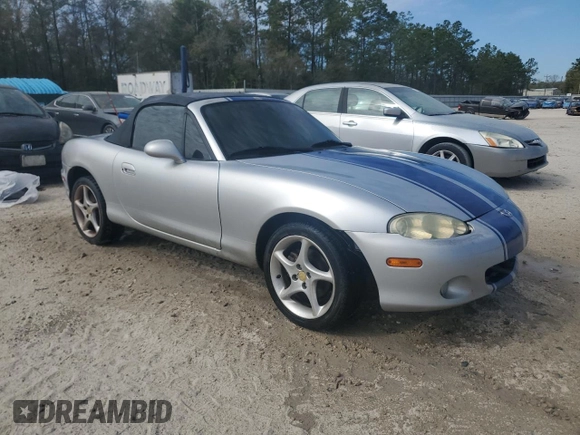 2003 Mazda MX-5 Miata Cloth with VIN JM1NB353430304103, listed as a Copart auction lot 50574245 with Not provided miles and Salvage title. Bid and sale history available at DreamBid. Image 4.