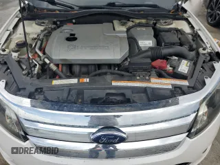 2010 Ford Fusion Hybrid z VIN 3FADP0L34AR186085, wystawiony jako Copart lot #55291735 z przebiegiem 282 029 mil mil oraz Szkody całkowita. Historia ofert i sprzedaży dostępna na DreamBid. Obrazek 11.