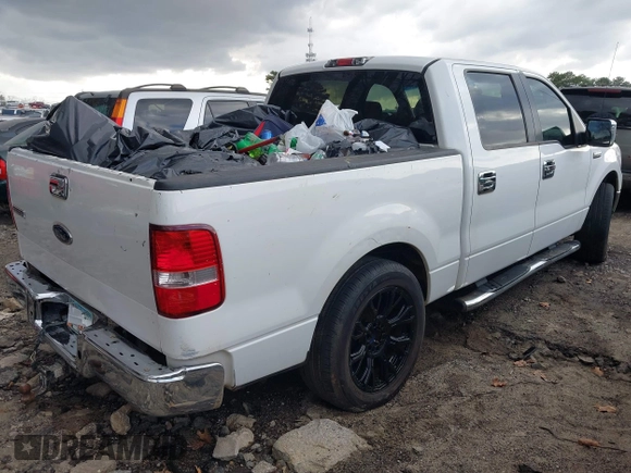2005 Ford F-150 XLT with VIN 1FTRW12W35KC97855, listed as a IAAI auction lot 41726385 with 295,397 mi miles. Bid and sale history available at carsss.com. Image 4.