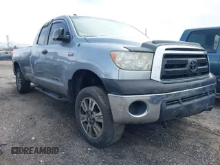 2012 Toyota Tundra 4WD Truck SR with VIN 5TFCW5F19CX012832, listed as a IAAI auction lot 41726453 with 232,078 mi miles. Bid and sale history available at carsss.com. Image 1.