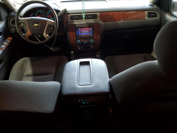 2013 Chevrolet Tahoe LS with VIN 1GNSCAE03DR212317, listed as a Copart auction lot 50511725 with 135,325 mi miles and Salvage title. Bid and sale history available at DreamBid. Image 8.