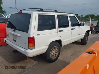 1998 Jeep Cherokee Sport z VIN 1J4FJ68S6WL124839, wystawiony jako IAAI lot #42421174 z przebiegiem 167 762 mil mil oraz . Historia ofert i sprzedaży dostępna na DreamBid. Obrazek 4.
