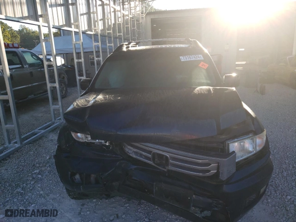 2012 Honda Ridgeline RT with VIN 5FPYK1F21CB458655, listed as a Copart auction lot 73167424 with 134,725 mi miles and Salvage Title. Bid and sale history available at carsss.com. Image 5.