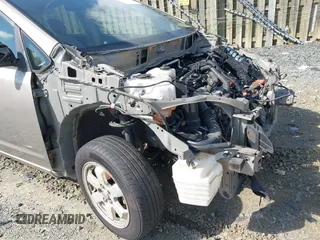 2004 Toyota Prius z VIN JTDKB22U040116044, wystawiony jako IAAI lot #42533237 z przebiegiem Nie podano mil oraz . Historia ofert i sprzedaży dostępna na DreamBid. Obrazek 13.