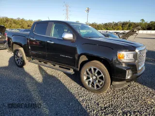 2021 GMC Canyon 2WD Denali with VIN 1GTG5EEN2M1107052, listed as a Copart auction lot 76377704 with 11,696 mi miles and Salvage Title. Bid and sale history available at carsss.com. Image 4.