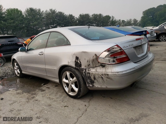 2004 Mercedes-Benz CLK-Class 3.2L with VIN WDBTJ65J74F072751, listed as a Copart auction lot 55059143 with 104,698 mi miles and Salvage Title. Bid and sale history available at carsss.com. Image 2.