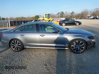 2015 Audi A6 Premium Plus z VIN WAUFGAFCXFN004840, wystawiony jako IAAI lot #41541257 z przebiegiem 163 050 mil mil oraz . Historia ofert i sprzedaży dostępna na DreamBid. Obrazek 14.