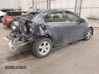 2014 Chevrolet Cruze 1LT z VIN 1G1PC5SB9E7449623, wystawiony jako IAAI lot #42277550 z przebiegiem 175 964 mil mil oraz . Historia ofert i sprzedaży dostępna na DreamBid. Obrazek 4.