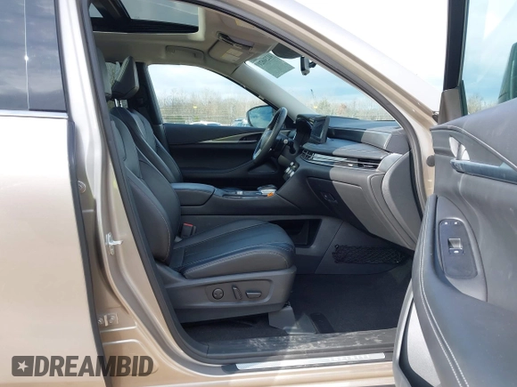 2023 Infiniti QX60 Luxe with VIN 5N1DL1FR5PC359109, listed as a IAAI auction lot 41236821 with 30,386 mi miles and . Bid and sale history available at DreamBid. Image 5.