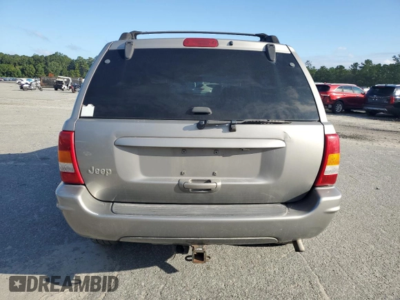 2002 Jeep Grand Cherokee Limited with VIN 1J4GX58S32C149852, listed as a Copart auction lot 71655864 with 190,918 mi miles and Salvage Title. Bid and sale history available at DreamBid. Image 6.