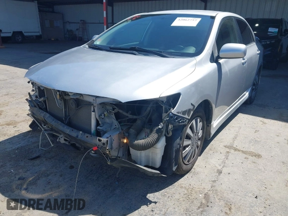 2009 Toyota Corolla with VIN 1NXBU40E99Z105346, listed as a IAAI auction lot 42062757 with 130,968 mi miles. Bid and sale history available at carsss.com. Image 6.