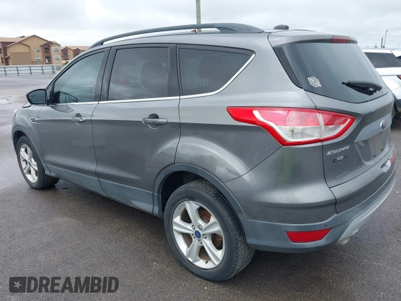 2014 Ford Escape SE with VIN 1FMCU9GX3EUB06947, listed as a IAAI auction lot 42193325 with 138,923 mi miles and . Bid and sale history available at DreamBid. Image 3.