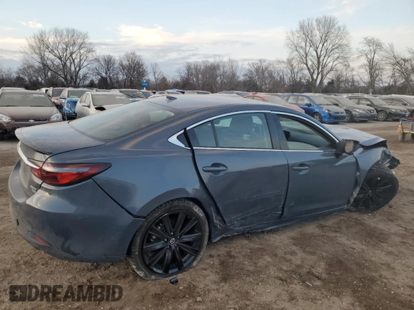 2021 Mazda 6 Carbon Edition with VIN JM1GL1WY6M1608632, listed as a Copart auction lot 88045655 with 48,749 mi miles and Salvage Title. Bid and sale history available at DreamBid. Image 3.
