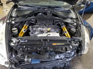 2009 Nissan 370Z z VIN JN1AZ44EX9M407193, wystawiony jako Copart lot #84891734 z przebiegiem 129 296 mil mil oraz Szkoda całkowita • Salvage title. Historia ofert i sprzedaży dostępna na DreamBid. Obrazek 11.
