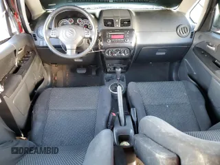 2013 Suzuki SX4 LE with VIN JS2YC5A37D6101819, listed as a Copart auction lot 82367044 with 142,932 mi miles and Salvage Title. Bid and sale history available at carsss.com. Image 8.